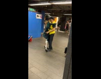 Man dance with skeleton at train station