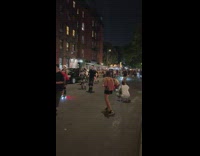 Lots of roller skater pass by street night