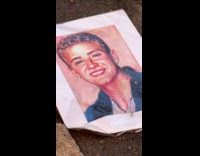 Portrait of Justin Timberlake left on street 