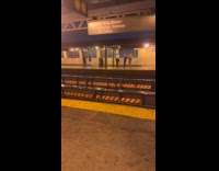 Collab WINY - 2 people fighting at subway platform 