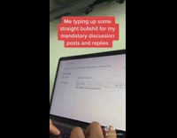 Guy typing on computer laptop