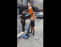 Guy orange traffic cone over head pt. 3 
