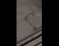 Rat with bagel on the subway rail