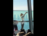 Woman white top selfie at building balcony