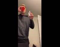 Guy attempts to drink shot on fire