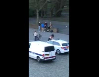Girl sit on police car siren blows