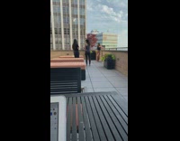 Collab IITW - Black shirt girl pretends to read rooftop