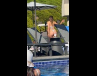 Woman in bikini with drinks poolside photoshoot Part 3