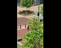 Guy red jacket tiktok dance brick floor   