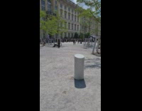 People act like horses at the park while crowd watches