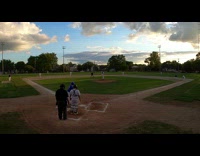 Baseball game player line into triple play