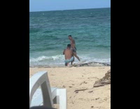 Collab IITW - Man shorts and sunglasses walk pose beach