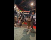 Group sets up red carpet at station