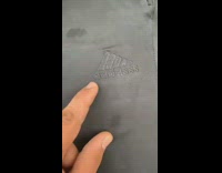 Guy reads Adidas knockoff on sweatpants 
