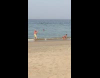 IITW - old man takes pictures of womans butt on beach