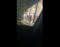 Collab IITW - Two people tiktok dance near the building