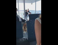 Woman black dress flex butt boat railings