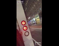 Woman back of white delivery truck new york 