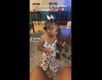 Little girl poses for a picture selfie 