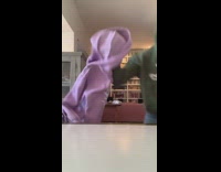 Girl switches hoodies bangs head on table