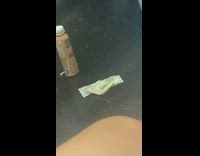 Dollar bills burn in train aisle 