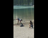 girl handstand splits lake