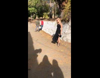 Woman black dress skirt spin photo shoot