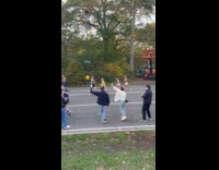 Collab WINY - People hand out beer to runners in NYC marathon