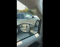 Girl films video car turns phone falls 