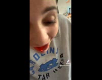 Girl swallows entire red jello ball and then spits it back out 