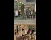 Woman places phone on the glass and then twerks