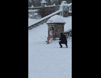 Woman white swimsuit lean on stairs snow
