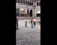 Three women tiktok dance inside the temple