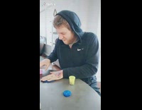 Man playing with play doh dont let felons clean your house 