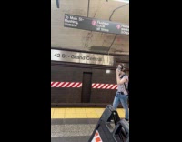 Collab Subway Creatures - Woman wear gas mask at train station