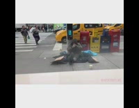 Man sits on the sidewalk on cardboard boxes and smokes #BluePointWhatTheL