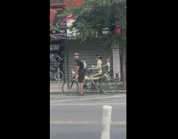 Old man ride bike with two skeletons