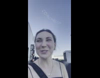 Girl films coachella sky writing behind her 