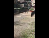 Two people bend exercise bridge video shoot