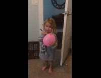 Little girl pops balloon screams