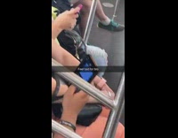 Girl types long text on subway