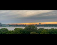 Sunset timelapse over river in new york 