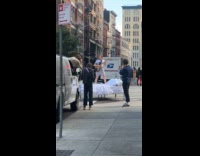 Collab WINY - Man plays guitar on street for photoshoot