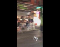 People wave white cloth napkins around restaurant 