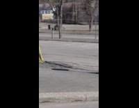 Woman exercise over stone table outside street