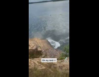 Collab VIBES - Guy slips and falls off during cliff jump