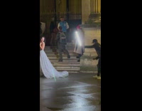 Two women in poses in their different photoshoot at the Louvre Part 2