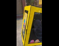 Kid wears Pac-Man arcade machine as costume