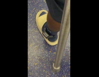 Person in train wear electronic tagging ankle device