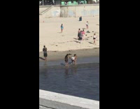 Woman wet white short twerk beach